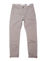 The Paulo Pavia 1 V2 Chino - Fungi by Blue de Gênes is a beige casual pant with front pockets, belt loops, and folded cuffs. Made from cotton stretch fabric, it features a white label on the waistband and a button closure for comfort.