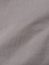 Close-up of Paulo Pavia 1 V2 Chino - Fungi by Blue de Gênes, showcasing light purple cotton stretch fabric with a smooth, subtly textured surface and distinct diagonal weave.