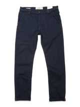 The Blue de Gênes Paulo Pavia 1 V2 Chino in Midnight Blue features a straight-leg cut, cotton stretch fabric, front pockets, button and zip closure, belt loops, and turned-up cuffs—vintage military-inspired, shown flat on a white background.