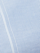 The close-up of the Basso Hackney Shirt - Blue Stripe by Blue de Gênes features thin vertical pinstripes and a visible left seam. Its smooth texture beautifully showcases the intricate pattern, ideal for logo embroidery on this classic cotton shirt.