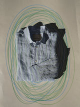 The BGenrico Mida Shirt - Blue Stripe by Blue de Gênes, featuring light blue and green stripes and a cut away collar, is neatly folded on a beige background with overlapping blue and green oval accents.