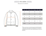 Illustration of the Blue de Gênes Cappa Stripe Cardigan - Whitecap in cotton yarn, with orange dashed lines marking chest, sleeve, and back measurement points. A size chart for sizes S to XXXL (cm) appears on the right.