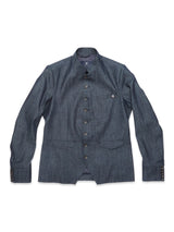 The Casella Wasabi Blazer by Blue de Gênes is a denim blue, long-sleeved jacket with a mandarin collar, Buffalo horn buttons, chest pocket, and buttoned cuffs, shown flat on a white background.