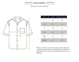 Illustration of the Blue de Gênes Colonnello Delo shirt, a short-sleeve, button-up cotton shirt featuring a jacquard pattern. Includes S to XXXL size guide with chest and back length in cm. Note: measurements may vary due to material and process differences.