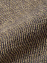 Close-up of BGpalco Lin Pants - Grey Mel by Blue de Gênes, showing textured grey fabric with diagonal ridges and a fine weave. The natural surface has a soft fold, visible threads, and a tactile, slightly uneven appearance.