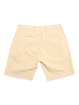 Back view of Blue de Gênes BGmenzino Vecchio Shorts in pale khaki, featuring lightweight cotton chino fabric, belt loops, and two back welt pockets, shown on a white background.