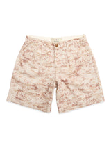 The BGcupra Print Shorts by Blue de Gênes are beige, wide-fit shorts with a light brown abstract camo pattern, front button and zip closure, and side pockets.