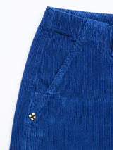 Close-up of Blue de Gênes BGfloyd Cord Shorts in Navy Peony, featuring a front pocket and metal emblem by the seam. The loose fit and vertical ridges emphasize the comfort and signature corduroy texture of these shorts.