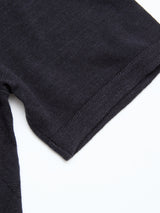 Close-up of the sleeve of the Blue de Gênes BGwally Diamond Polo in Dark Navy, highlighting the textured lightweight knit fabric and neatly finished hem, set against a white background.