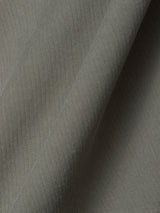 Close-up of the Shadow Green BGhunter Vecchio Jacket by Blue de Gênes, featuring light gray fabric with a diagonal twill weave, subtle texture, and gentle folds—ideal for a refined cotton stretch or lightweight field jacket.