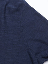 Close-up of Monte Knit - Navy by Blue de Gênes, showing a sleeve of the crewneck jumper. The fabric is soft and slightly heathered, crafted from a cotton/linen blend, with visible seams outlining its edges.