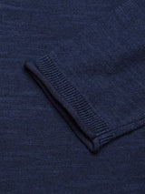 Close-up of the Monte Knit - Navy by Blue de Gênes, showcasing a sleeve section. The cotton/linen blend texture highlights ribbed cuffs, contributing to its refined detailing.