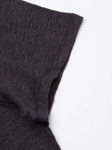 Close-up of a dark navy sleeve with natural texture and visible seam details on a white background. The fabrics textured appearance suggests a knit or woven material from the Blue de Gênes Totti T-Shirt.