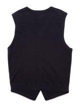 The Zorba Knit Waistcoat - Navy by Blue de GĂȘnes features a soft fabric in the back with a straight hemline and central notch. Its simple stitching and absence of patterns or embellishments highlight its understated elegance.