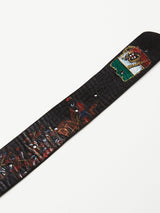 Introducing the Blue de Gênes Gari Belt - Black, a premium leather accessory featuring a vibrant cavalry battle scene with the Mexican flag emblem. With adjustable holes, this dark-colored belt is more than just an accessory; its a wearable piece of art.