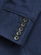 Close-up of the Blue de Gênes Casella Officers Blazer - Dark Navy sleeve, featuring four black blues buttons on brushed cotton fabric. The textured navy enhances a vintage parade uniform vibe, with visible stitching highlighting its refined design.