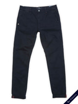 Navy slim-fit Teo Chino by Blue de Gênes, featuring front pockets, button-zip closure, and a small emblem on one pocket. Made from honeycomb fabric and part of The Classics collection, laid flat on white with The Classics in the bottom corner.