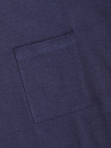 Close-up of the Sagi Nuovo T-shirt in Dark Navy by Blue de Gênes, featuring a neatly stitched small square pocket on premium cotton fabric. Its clearly defined edges make it a staple that blends style and quality.