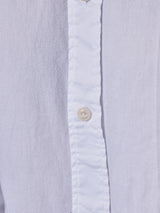Close-up of the Miguel Brilliante Shirt - White by Blue de Gênes, crafted from Italian cotton with textured fabric and Corozo nut buttons along the center seam.