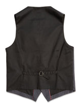 The image shows the back of a Canna Pallone Gillet - Navy Stripe by Blue de Gênes, featuring a striped inner lining, an adjustable strap with a metal buckle at the waist, and pointed ends at the bottom, seamlessly merging traditional elegance with modern style.