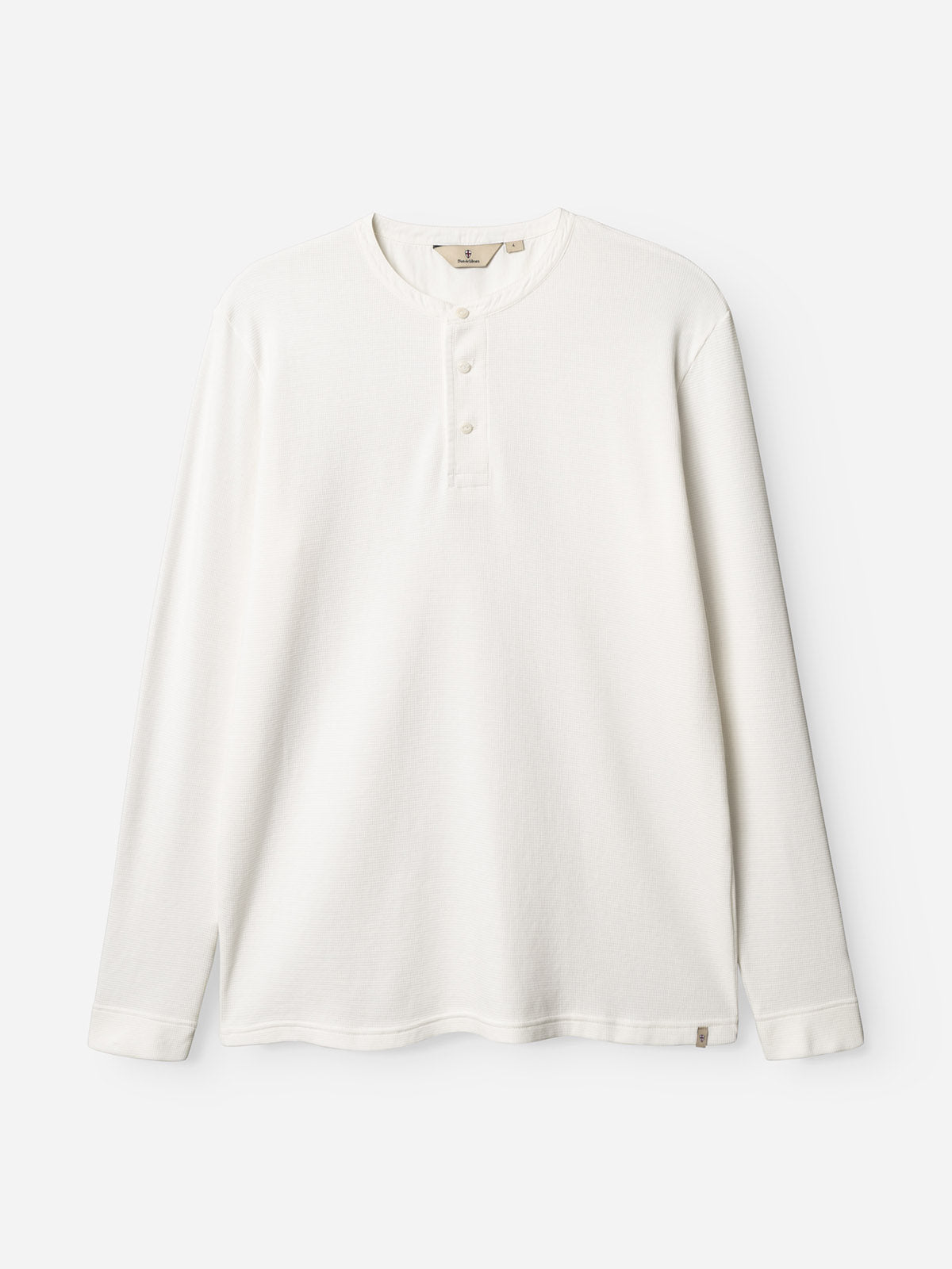 The BGgreg L/S Grandad - White by Blue de Gênes is a regular fit, long-sleeve cotton poplin Henley shirt with a round neckline and corozo nut three-button placket, shown on a plain white background.