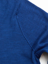 Close-up of the BGmonty Knit - Navy Peony by Blue de Gênes, highlighting the detailed stitching along the shoulder seam of this navy crewneck jumper against a white background.