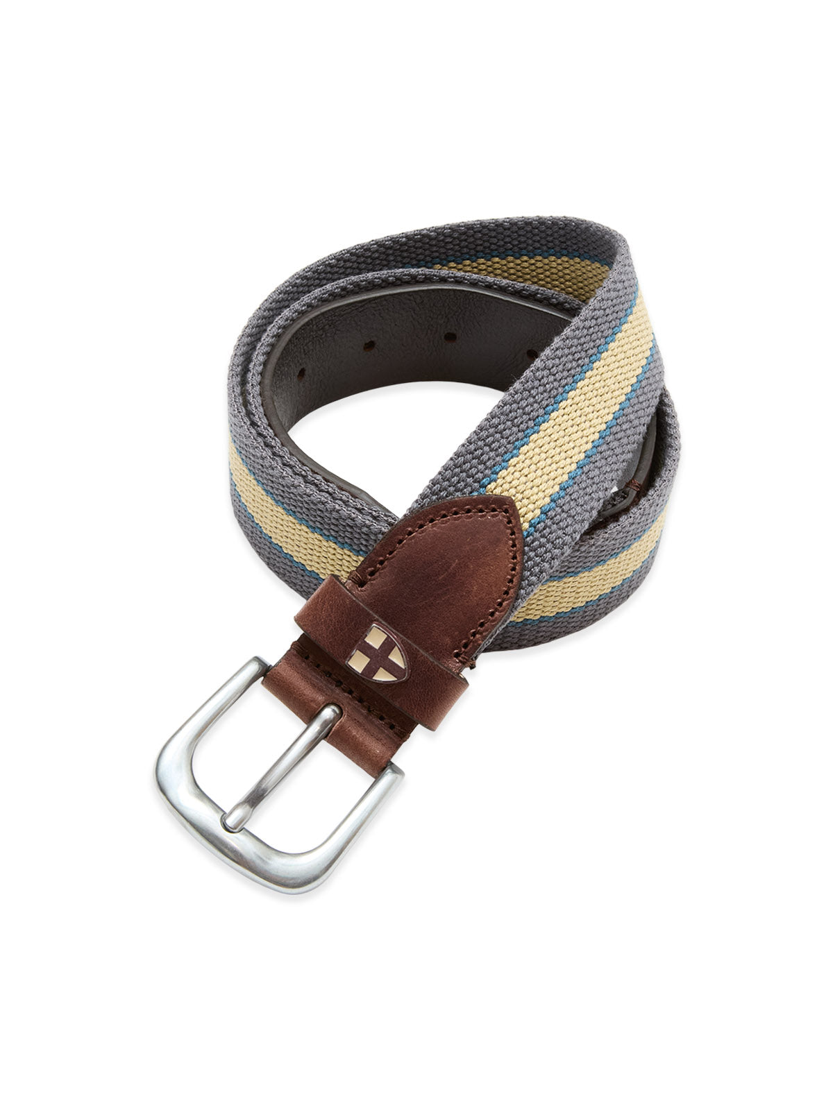 The Blue de Gênes BGcollege Belt - Green Stripe features striped webbing, brown leather accents near the silver buckle, and a small shield logo embossed on the leather.