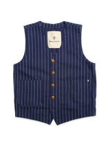The BGlumen Toll Gilet - Navy Stripe by Blue de Gênes is a worker-inspired, blue pinstriped gilet featuring two large front pockets, brown buttons, and a white label inside the collar that reads Blue de Gênes.