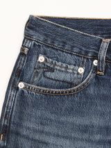 Close-up of the front pocket on Blue de Gênes BGmarco Rowan Jeans - Used, made in Greece with 11.5 oz denim, featuring a small coin pocket, metal rivets, belt loop, and distinct orange stitching.