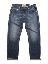 The BGmarco Rowan Jeans - Used by Blue de Gênes, featuring a relaxed fit, faded blue cotton denim, front pockets, and rolled-up cuffs, are displayed laid flat on a white background.