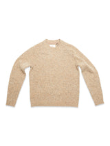 The Honshu Crewneck Knit - Fungi by Blue de Gênes is a beige, long-sleeve sweater laid flat on a white background, displaying its front with a simple crew neckline and ribbed cuffs and hem. Crafted from a soft lambswool blend, this chunky knit offers both warmth and timeless style.
