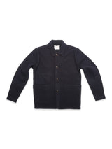 The Blue de Gênes Kojima Wool Jacket - Navy is a dark navy boiled wool overshirt with a collar and two large front pockets, blending classic style and cozy warmth, shown laid flat on a white background.