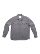 The Blue de Gênes Nagano Overshirt in Dark Slate is a solid gray, long-sleeve Moleskin cotton shirt with two button-flap chest pockets, shown laid flat on a white background.