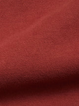 Close-up of the Nagano Overshirt - Henna by Blue de Gênes, showcasing its soft, reddish-brown Moleskin cotton fabric with a subtly textured surface and gentle folds for a smooth, cozy look.