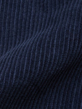 Close-up of the Masami Cord Blazer - Navy by Blue de Gênes, showcasing its dark blue corduroy fabric with signature vertical ribbed texture and velvety finish—ideal for a refined, versatile look.