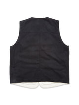 The Blue de Gênes Maurice Solid Gilet in Dark Navy is shown from the back on a white background, highlighting its tailored fit, slightly curved hem, and visible white lining at the bottom edge.