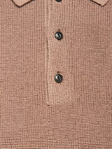 Close-up of the Porto Polo Knit - Fungi by Blue de Gênes, featuring a textured brown knit fabric with a collar and three black buttons—a refined staple in luxury menswear.