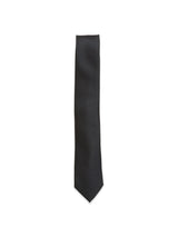 Nekutaki Tie #A in navy by Blue de Gênes features a subtle textured pattern and is elegantly displayed against a white background.