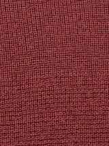 Close-up of the Porto Polo Knit - Henna by Blue de Gênes, featuring a textured, ribbed knit in reddish-brown with vertical lines—ideal for luxury knitwear like this classic wool polo shirt.