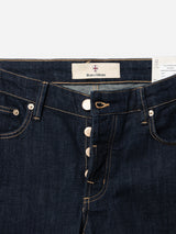 The BGvinci Girisha Rinse Jeans by Blue de Gênes feature a dark rinse wash, regular fit, comfort stretch denim, visible stitching, button fly, metal rivets, classic five-pocket design, and inner waistband label reading “Blue de Gênes.”.