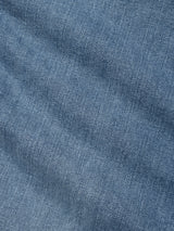 Close-up of BGvinci Pala Used V2 Jeans by Blue de Gênes in denim blue, highlighting the comfort stretch fabric’s textured, diagonal weave and subtle fading—hallmarks of classic, quality jeans.