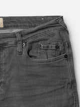 Close-up of the BGrepi Giulio Light V2 Jeans in grey denim by Blue de Gênes, featuring a slim fit with waistband, belt loops, front and coin pockets with black rivets in the classic five-pocket style.