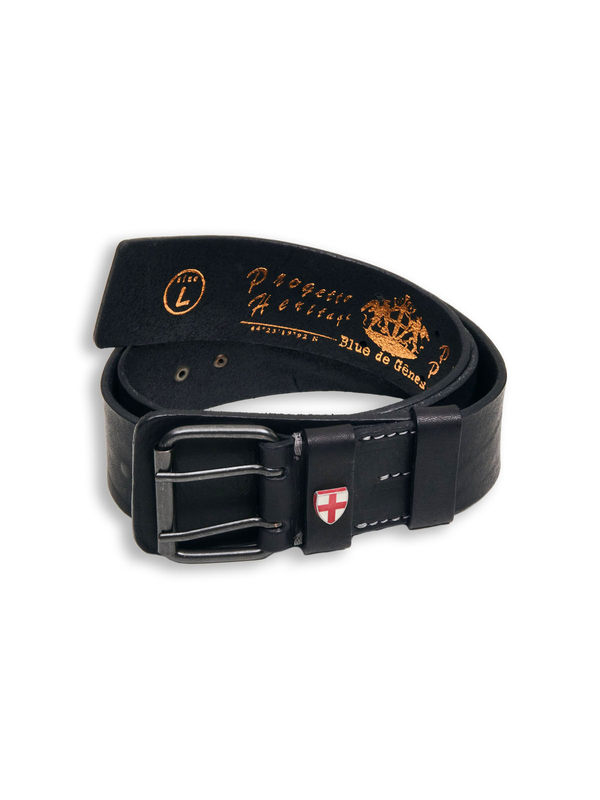 The Cintura Belt - Black by Blue de Gênes is made from cow leather with a metal buckle, white stitching, and a red and white shield emblem on the loop. Gold text and logos decorate the inner side for a stylish touch.