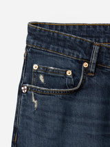 Close-up of the Blue de Gênes BGvinci Arrow Jeans in denim blue, featuring yellow stitching, a visible front pocket, a coin pocket adorned with a small badge, and subtle distressed details. Made from comfort stretch denim in a regular fit, these jeans deliver both style and ease for everyday wear.