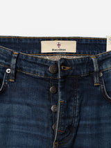 Close-up of BGvinci Hermina Jeans - Med Used in dark blue, featuring an open zipper that reveals the Blue de Gênes label above the waistband and visible branded buttons. Crafted from comfort stretch denim, these regular fit jeans by Blue de Gênes offer a perfect blend of style and ease of movement.