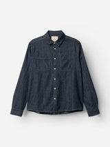 The BGgregor Denim Shirt - Denim Blue by Blue de Gênes is a dark blue indigo cotton button-up shirt featuring long sleeves, white buttons, and two chest pockets, shown on a plain white background.