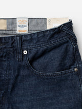 Close-up of the BGgiacomo Arthour Jeans - Denim Blue by Blue de Gênes, highlighting the front pocket, waistband, button, and a visible interior label that reads Candiani Denim Italian Premium Denim Fabrics. Made from comfort stretch denim for everyday wearability, these relaxed loose fit jeans unite premium craftsmanship with long-lasting durability.