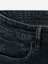 Close-up of the waistband, belt loop, and front pocket of the BGvinci Ewan Jeans - Color Denim by Blue de Gênes in a dark blue wash, crafted from comfort stretch denim with visible stitching and metal rivets.