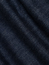 Close-up of the BGvinci Finlay Jeans - Vintage Wash by Blue de Gênes, showcasing rich dark blue denim with visible texture, diagonal lines, and subtle creases—highlighting the timeless appeal of this classic vintage wash style.