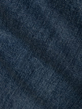 Close-up of the BGrepi Presley Jeans - Denim Blue by Blue de Gênes, highlighting the intricate denim texture, weave, and nuanced color variations—ideal for comfortable stretch jeans that offer both durability and a slim-fit silhouette.